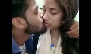 Sylheti girl giving a kiss in restaurant