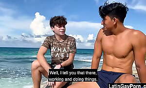 Latin elated boys fall back to the beach