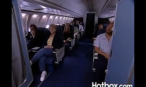Juli Ashton copulates ginger linn in an airplane