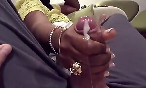 Desi woman gives varlet tugjob on train