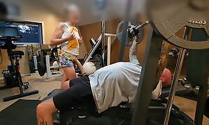 Mistress Amelia strap on high fucks Joey during while he's in the gym.